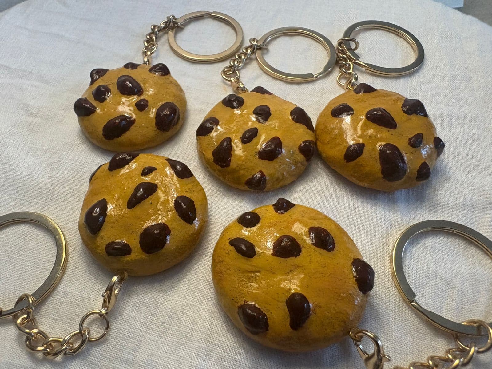 Handmade resin keychains on cloth